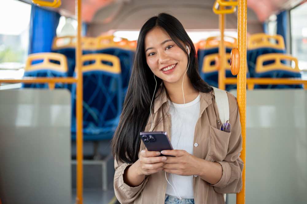 A female passenger in a Bus.